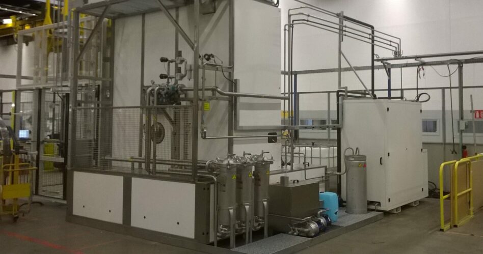 Cleaning and degreasing machine showing the filtration, tanks and evaporator